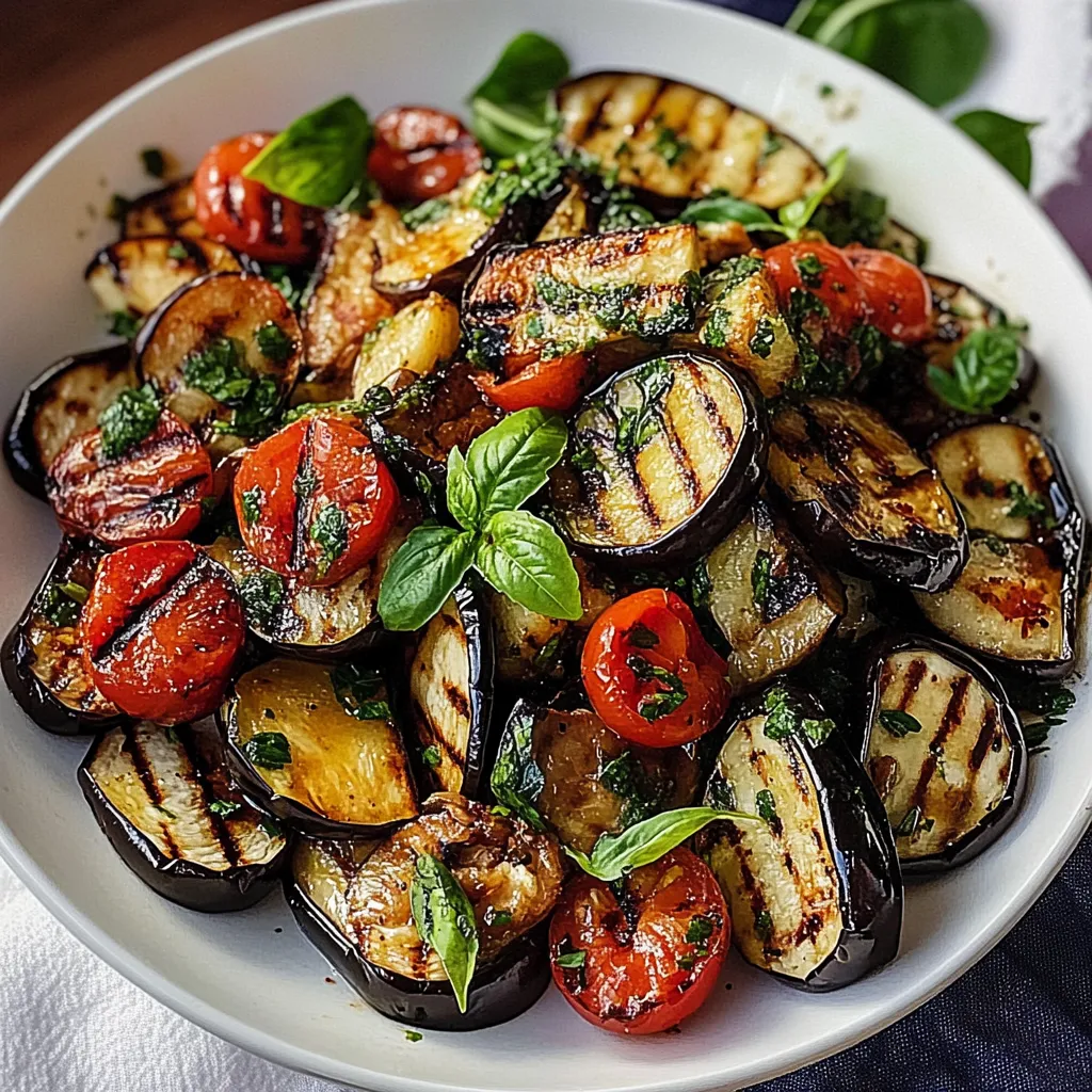 A bowl of vegetables including tomatoes, zucchini, and basil.