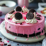 Creamy pink velvet Oreo cheesecake with a crunchy cookie crust and smooth, rich filling.