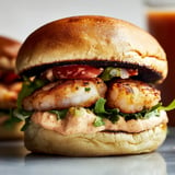 Juicy shrimp burgers packed with flavor, perfect for a seafood twist on a classic favorite.