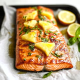 Tender salmon glazed with honey and pineapple for a sweet and savory tropical twist.