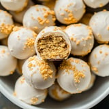 Sweet and creamy Golden Oreo truffles coated in white chocolate for a delightful treat.