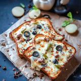 Crispy toast oozing with melted cheese and pizza toppings for a quick, satisfying snack.