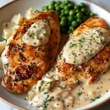 Creamy Boursin chicken with a rich, garlicky cheese sauce and tender chicken breasts.